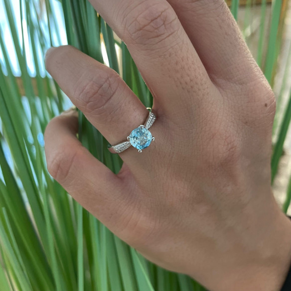 Goldring und Blauer Zircon NICOLE SOLITAR 1.50 99928928118